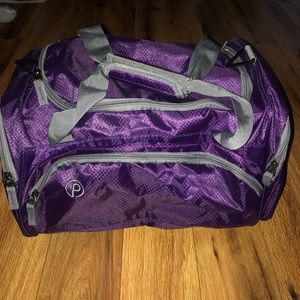 Athletic purple duffel bag